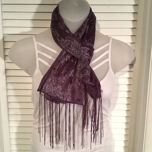 Grape colored scarf with silver thread.